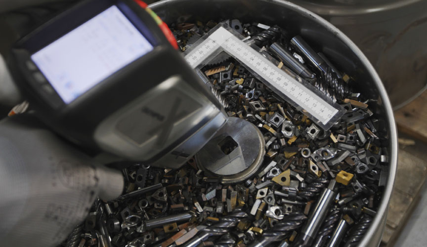 Used components being measured for recycling (photo)