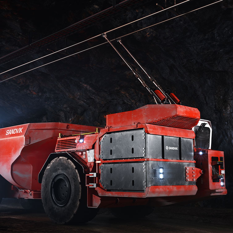 Sandvik® TH665B battery-electric truck in an underground environment. (photo)